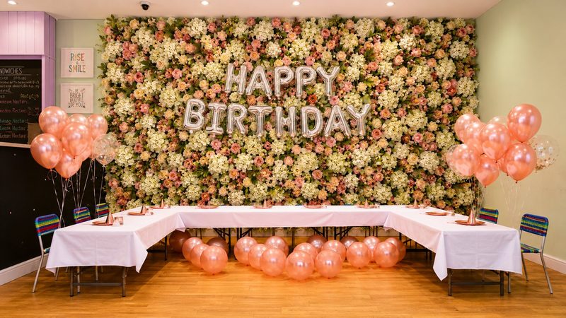 Flower wall party setup at N20 KidsClub